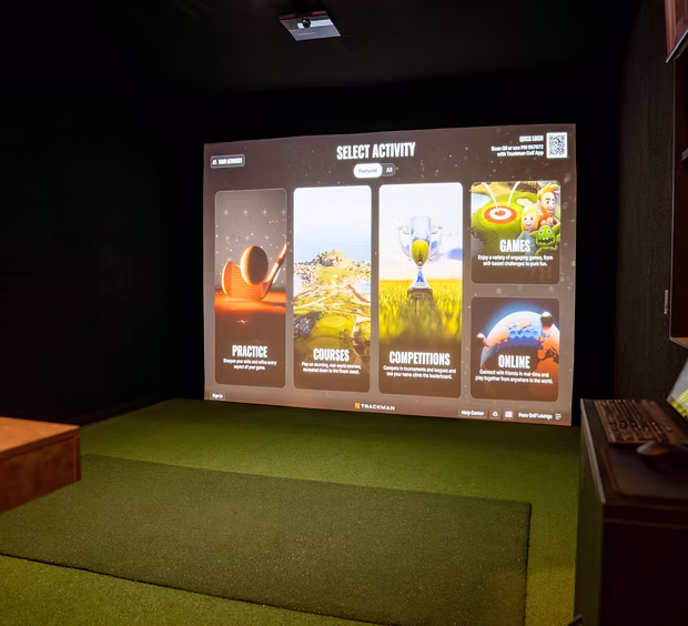 TrackMan simulator bay, screen ready to select an activity